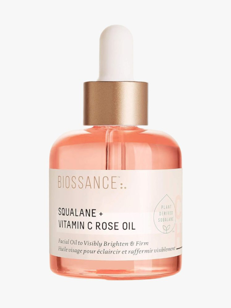 Biossance Squalane + Vitamin C Rose Oil in branded dropper component on a light gray background